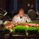 Exotic-foods chef Gene Rurka poses with whole cooked alligators at the 110th Explorers Club Annual Dinner at the hotel in March 15, 2014.